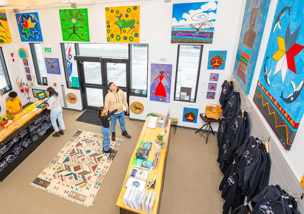 Customers browse the colourful paintings and artisan wares at Alan Syliboy Art Studio in Mi'kma'ki.