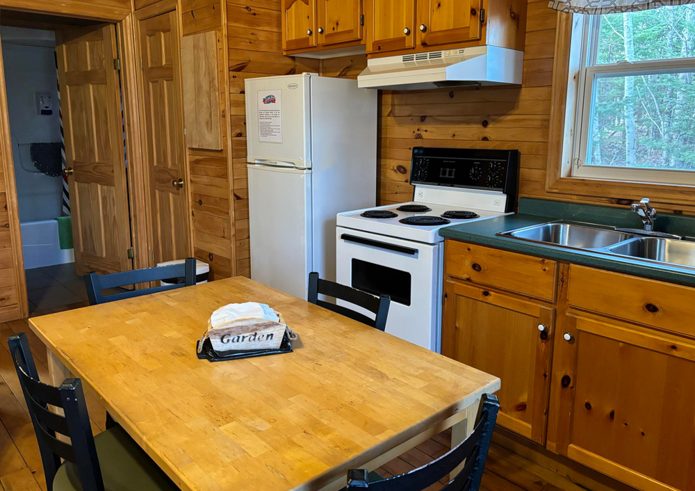 An image of a kitchen from one of the one bedroom cottages at Tidal Bore Rafting Resort.