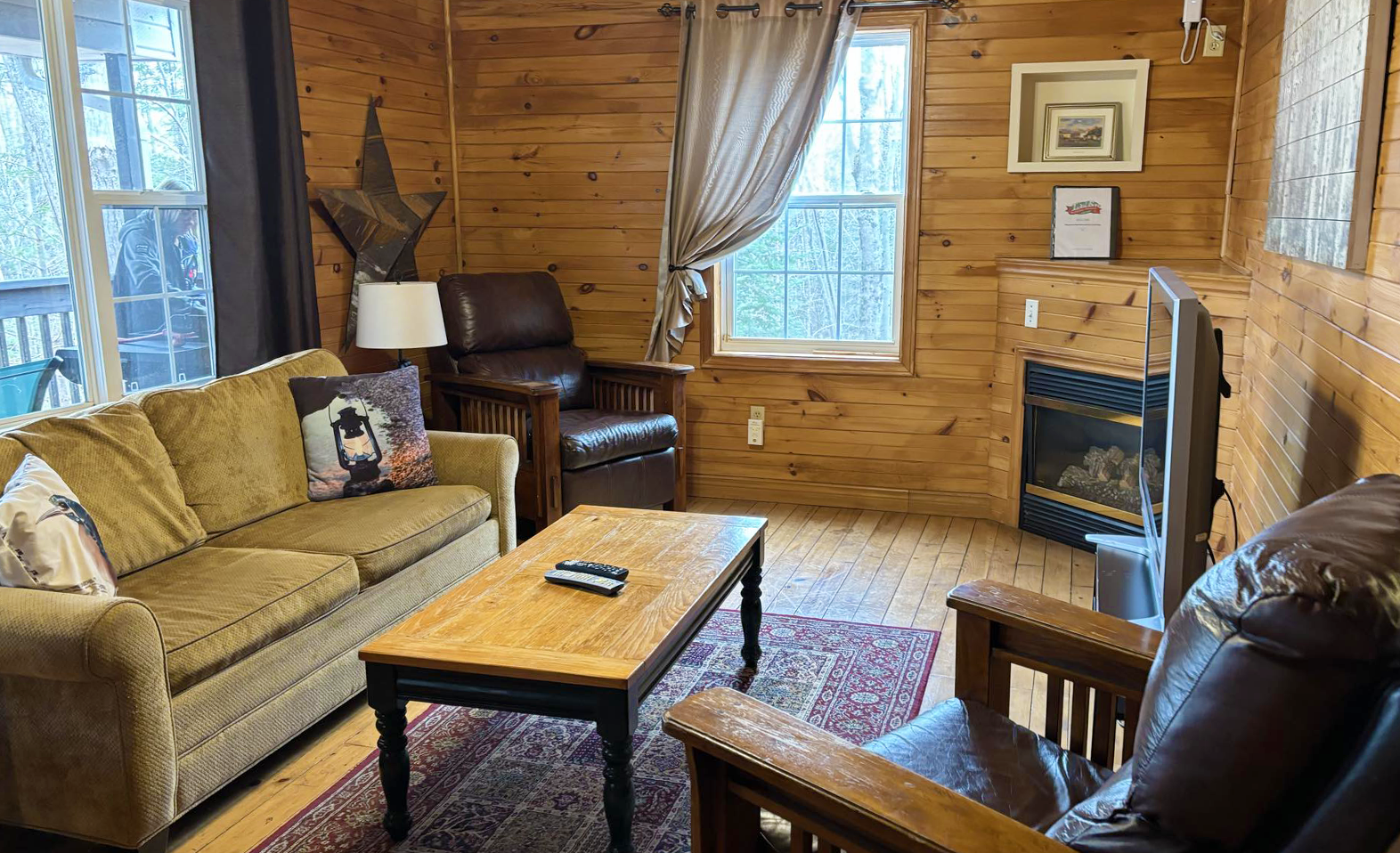 An image of the living room in one of the two bedroom cabins at Tidal Bore Rafting Resort.